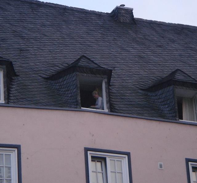 Girl in Attic on Fisch Markt in Cologne, May 21, 2007